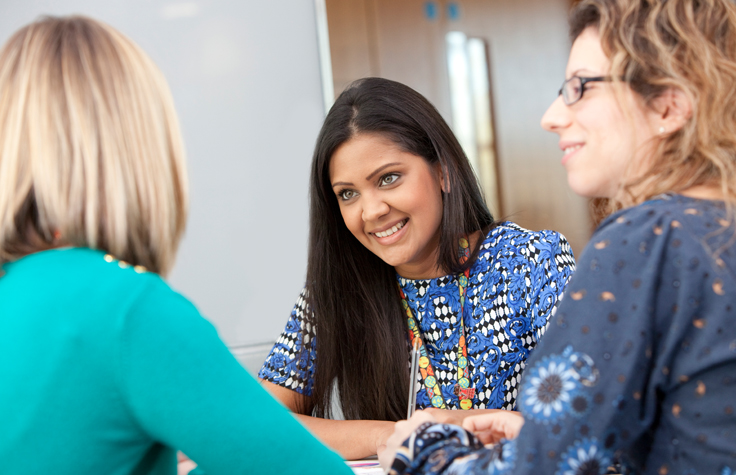 A group of women in discussion.