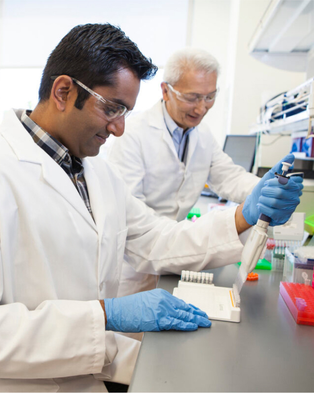 two researchers starting sequencing library prep